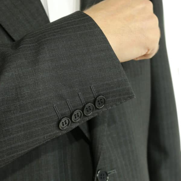 charcoal stripe suit close up