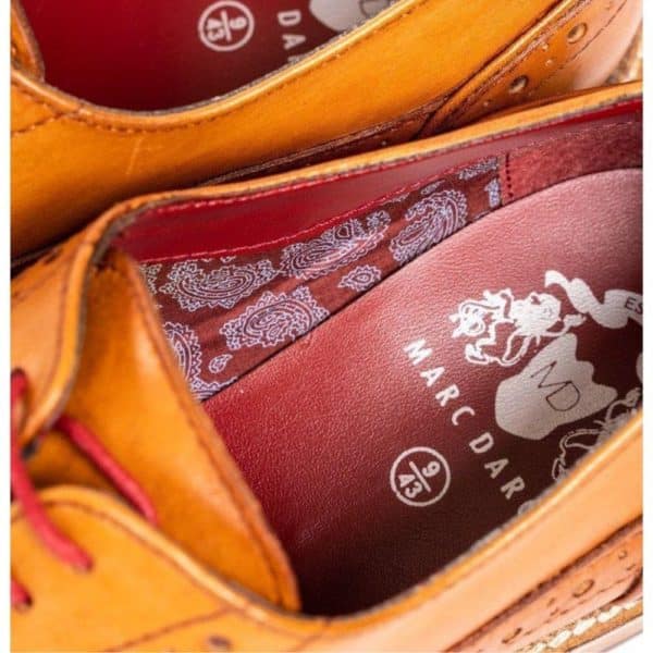 marc darcy tan shoe close up